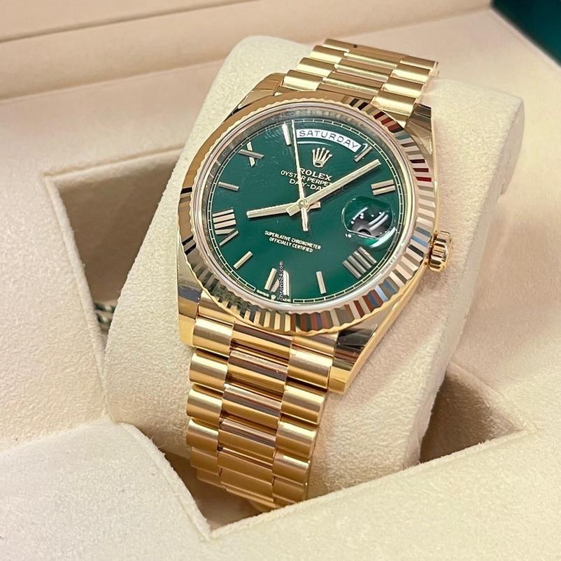Rolex Day-Date 40 40mm Like New (Unworn) 2025 (May) / Yellow Gold Green Dial/228238